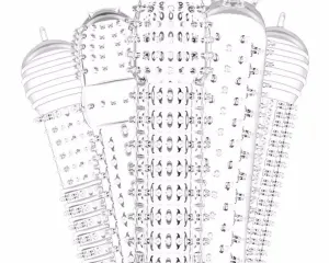 STORE-0071 - مؤسسة العبقري الصغير للتجارة الالكترونية Abstract silver sculpture with layered circular rings and studded panels forming a vertical column on a wide base.