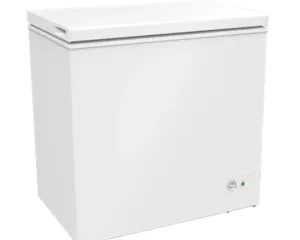 White chest freezer with a top-opening lid and a small front control knob on the lower right.
