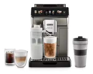 dada-0733 - مؤسسة العبقري الصغير للتجارة الالكترونية Coffee machine with built-in grinder and touch screen, brewing a frothy beverage into a tall glass cup and a secondary milk pitcher to the side.