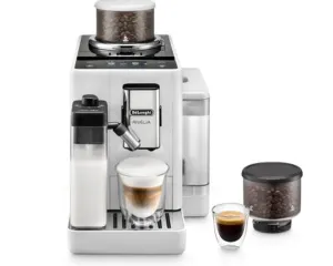 Automatic espresso machine with built-in grinder and milk frother, brewing a layered cappuccino in a glass cup with a side bean hopper and storage container nearby