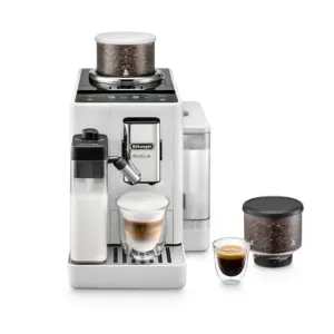 Automatic espresso machine with built-in grinder and milk frother, brewing a layered cappuccino in a glass cup with a side bean hopper and storage container nearby