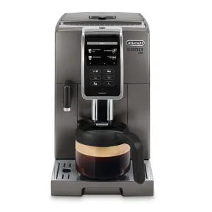 DeLonghi Dinamica Plus espresso machine with a glass coffee carafe on the drip tray