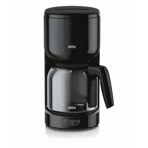 Black Braun drip coffee maker with glass carafe and a measurement-filled pitcher, power button at the base.