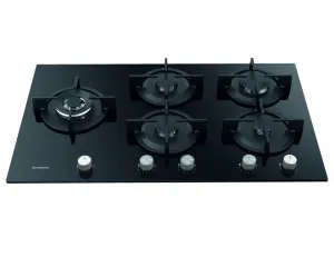 Black glass gas cooktop with five burners and five silver control knobs along the front.