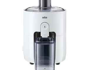 White vertical slow juicer with a clear juice container attached, Braun logo on the body, and a top feed chute.