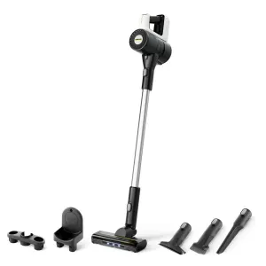 Cordless stick vacuum with a long wand and multiple cleaning attachments laid out on a white background.