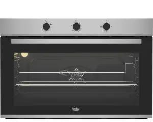 dada-0822 - مؤسسة العبقري الصغير للتجارة الالكترونية Beko stainless steel oven with glass door and three control knobs on the silver panel above the cavity.