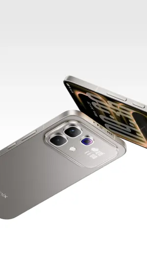 Close-up of a silver smartphone with a triple-camera rear array and a digital clock display on the back.