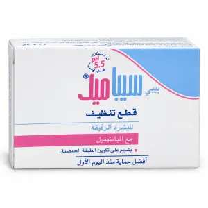 Product box for feminine hygiene item with Arabic text, mentions pH 5.5 and بانشيتول, white/pink/blue design surface visible on packaging