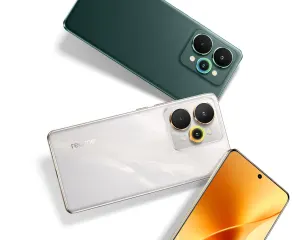 Green Realme smartphone back with a raised triple-camera module and LED flash, angled on white surface