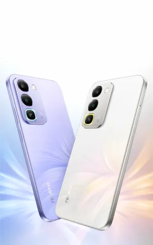 Two Realme smartphones in lavender and silver are angled to show their triple-camera rear modules and glossy finishes.